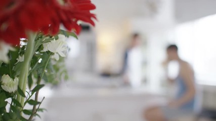 Young couple having time together one morning in their kitchen - Powered by Adobe