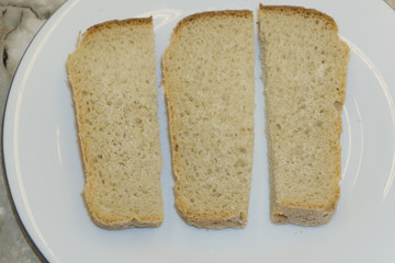 Set of three slices toast bread isolated on white .