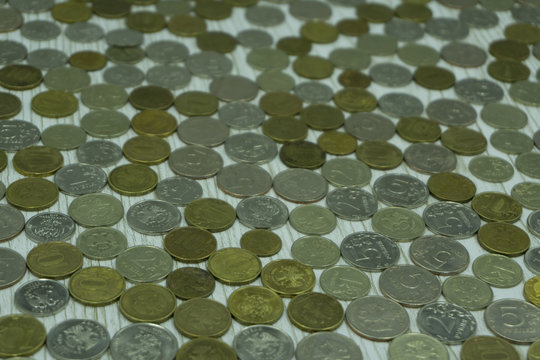 background of very many rouleau gold monetary or change coin .