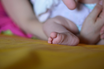 baby feet in bed