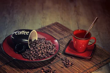 Dekokissen Kaffeebohnen mit Tasse © guy
