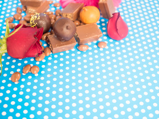 Homemade chocolates on blue background