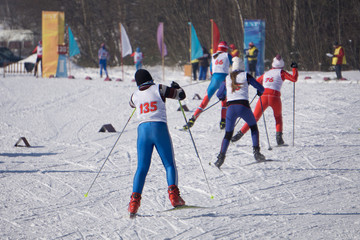 skiers at competitions winter skating race at 30 km