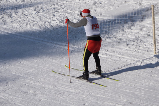blurred image legs men skier athlete ski racing competitions .