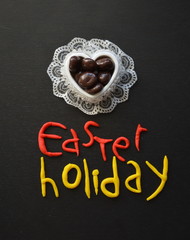 Chocolate Snacks in a Heart-Shaped Box, Easter Holiday Composition