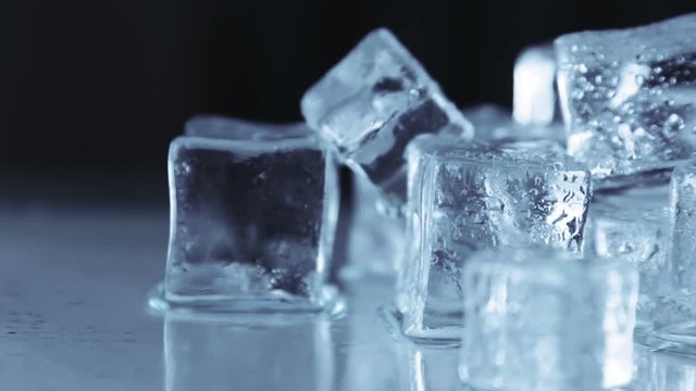 Ice cubes for drinks. Simulate cold ice cubes. The video dolly. Tone video