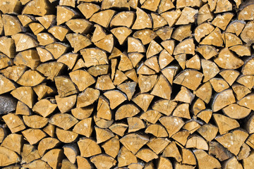 cut firewood background, wooden material texture, dry firewood background, abstract and close-up