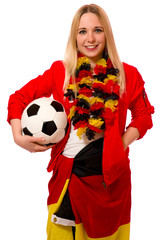 Junge Frau mit Fußball