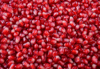 Pomegranate background. Pomegranate seeds. Macro.