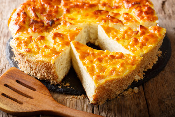 Homemade rice pie with cottage cheese, eggs and sugar close-up. horizontal