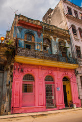 Street scene with traditional colorful buildings in downtown Havana. Cuba
