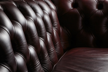 texture of the dark leather couch stitched buttons - 198594384