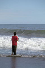 Man fishing in the ocean