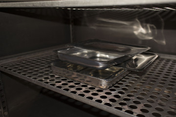 Fototapeta na wymiar medical trays in medical Cabinet