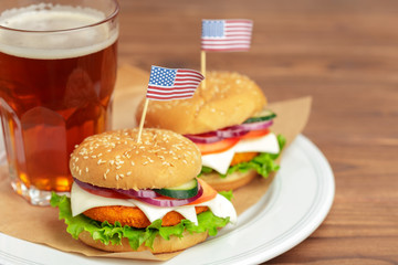 Fast food, homemade burger on a wooden background