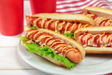 Hot dogs on wooden background