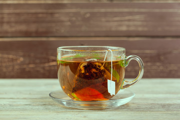 Cup of tea on wooden table