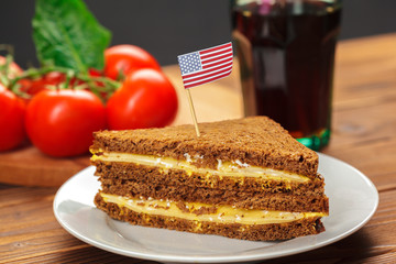 sandwich on a wooden table