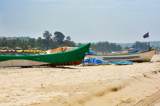 Fishing boats on the sand on Arambol beach in North Goa.India 