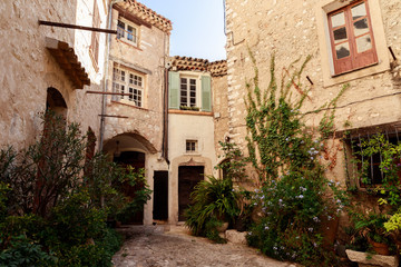 Fototapeta na wymiar facades of ancient stone buildings at old european town, Antibes, France