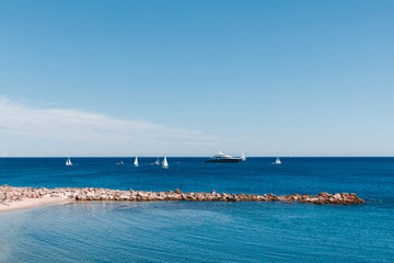 sailboats floating in sea on sunny day, Antibes, France