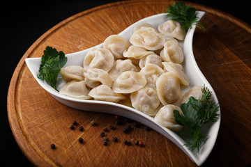 Boiled dumplings with herbs