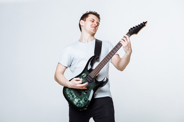guy with a guitar on a white background
