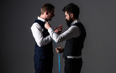 Client with strict face smoke cigar and hold glass