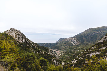 aerial view of beautiful green mountains on cloudy day, Sainte Agnes, France