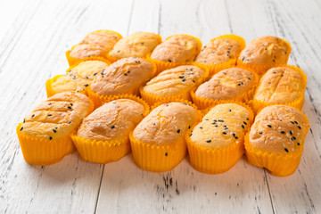 homemade slim cup cakes on a wood background