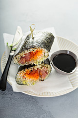 Sushi or poke burrito with nori