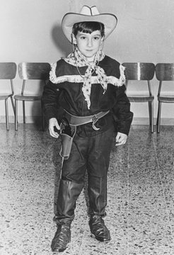 Young boy dressed as cowboy in 1953