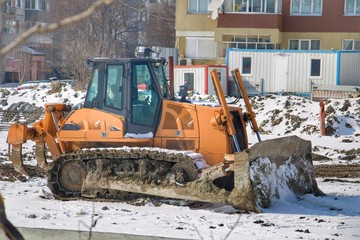Machine remove snow from a city street