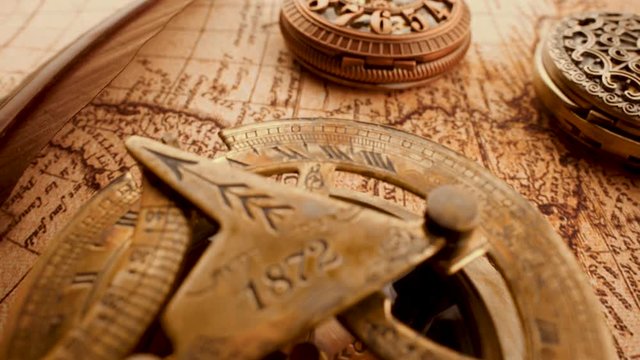 Vintage still life on an old map in 1565.