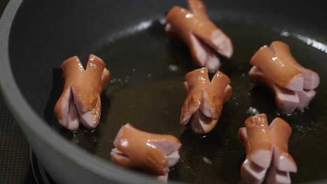 Sausages On A Frying Pan Movement