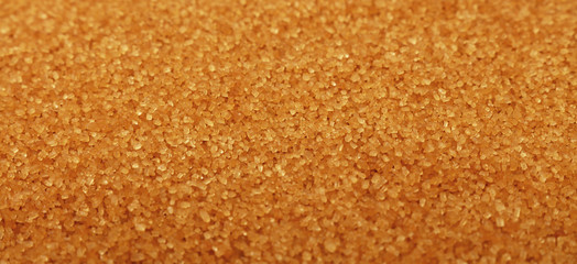 Close up background of brown cane sugar