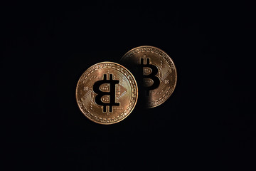 Golden Bitcoin on Black Background