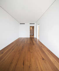 Empty white room with dark parquet, quality