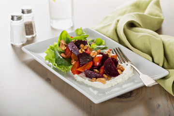 Gourmet beet salad with cheese and lettuce