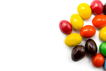 Painted Easter eggs with candy egg on white backgrou isolated