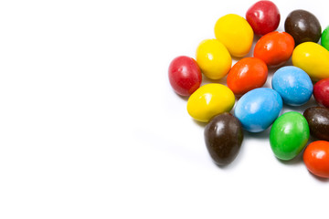 Painted Easter eggs with candy egg on white backgrou isolated