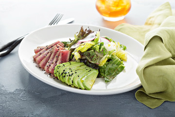 Tuna salad with sliced avocado