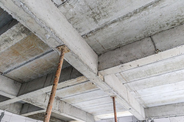 building under construction with iron steel support concrete beams