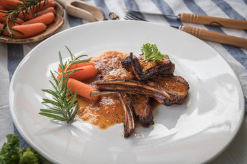 lamb steak on white plate