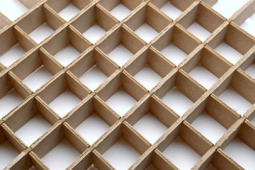Grid from cardboard background. Wood lattice pattern.