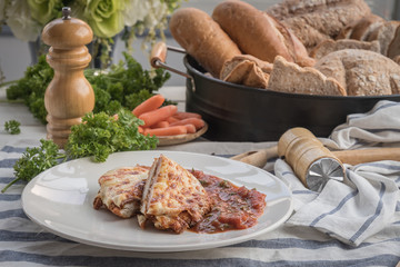 cooking healthy diet food in the home kitchen, Healthy Chicken parmesan