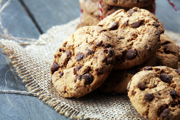 Chocolate cookies on wooden table. Chocolate chip cookies