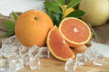 Oranges with fruits on the table