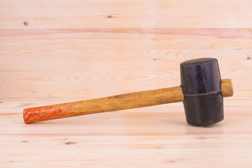 mallet on wooden background