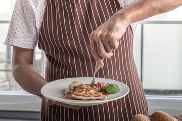 cooking healthy diet food in the home kitchen, Healthy Chicken parmesan